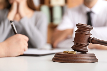 Judge gavel on table in lawyer's office.
