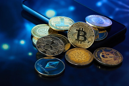 Several golden cryptocurrencies highlighting the Bitcoin coin with graphics in blue color.