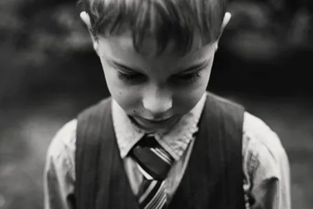 An image of a boy in black and white.
