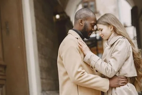 A couple standing in a sweet pose for their prenup photoshoot.